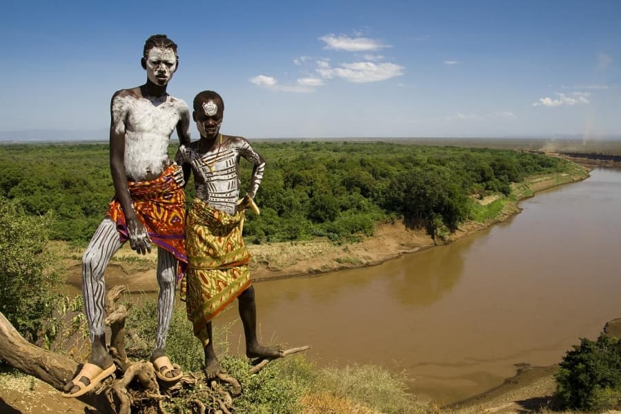Karo men overlooking the Omo River