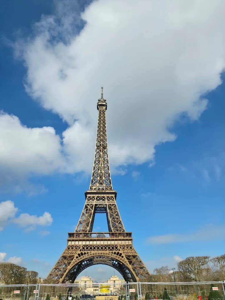 The Eiffel Tower is a lattice tower on the Champ de Mars in Paris, France