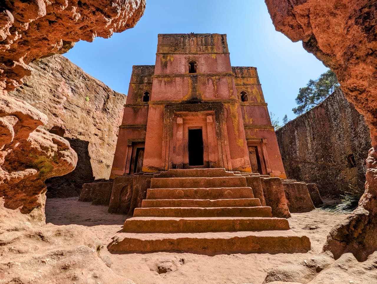 Bete Giyorgis, the rock-hewn Church of St. George, framed by red rock in Lalibela, Ethiopia