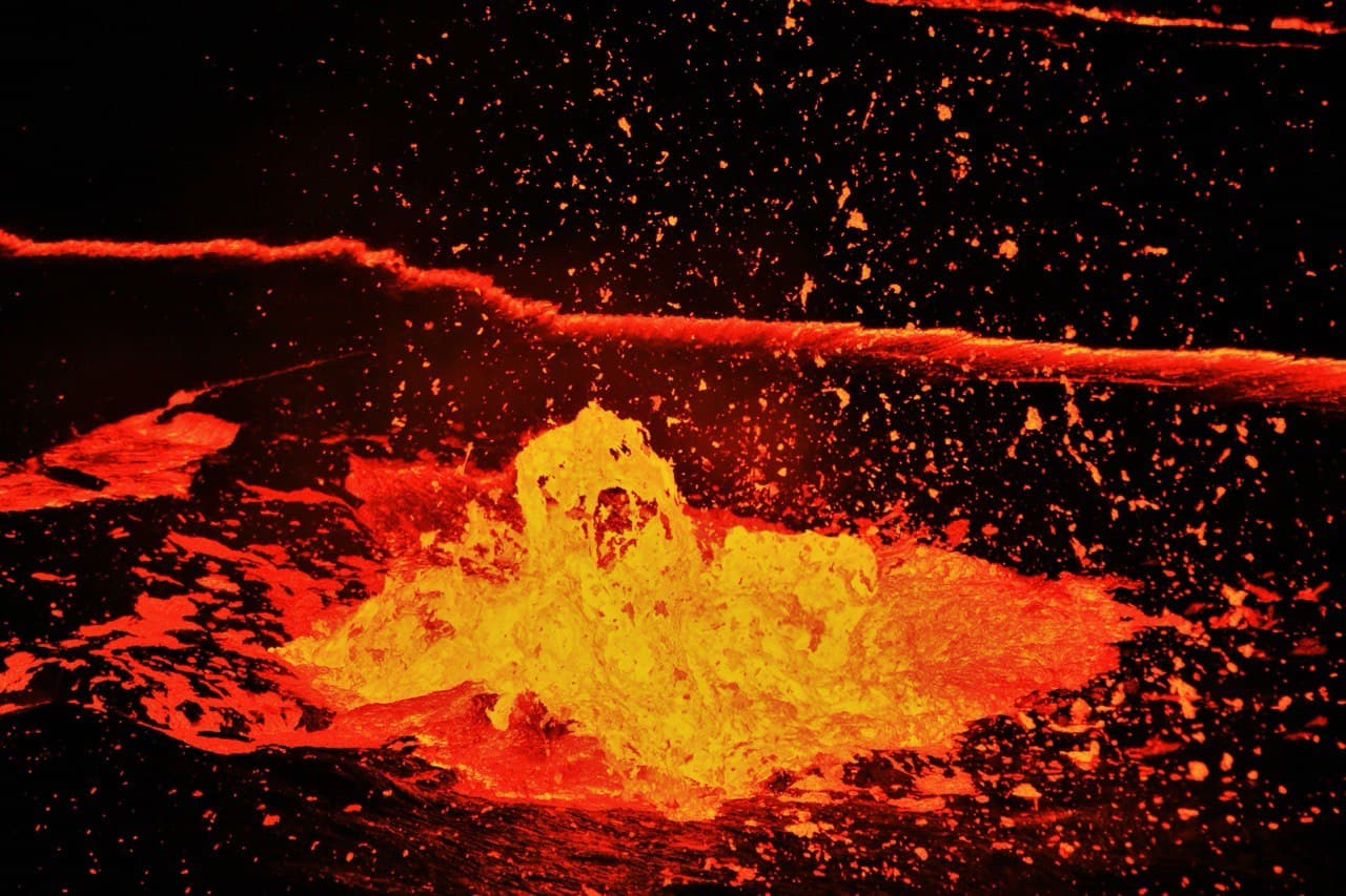 Bubbling orange lava lake at Erta Ale volcano in the Danakil Depression, Ethiopia