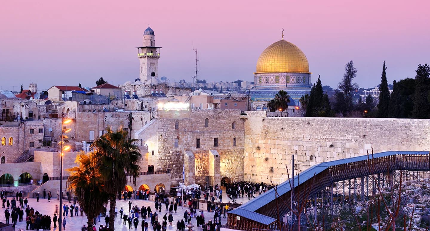 Jerusalem's Western Wall and the golden Dome of the Rock at sunset