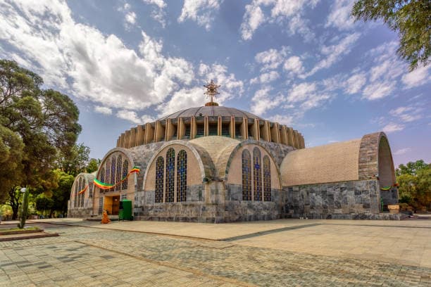 Axum Tsion arched stone facade and stained-glass windows in Axum, Ethiopia