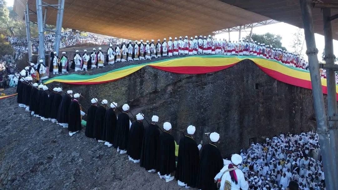 Crowds gathered in celebration at one of Lalibela's rock-hewn churches, Ethiopia