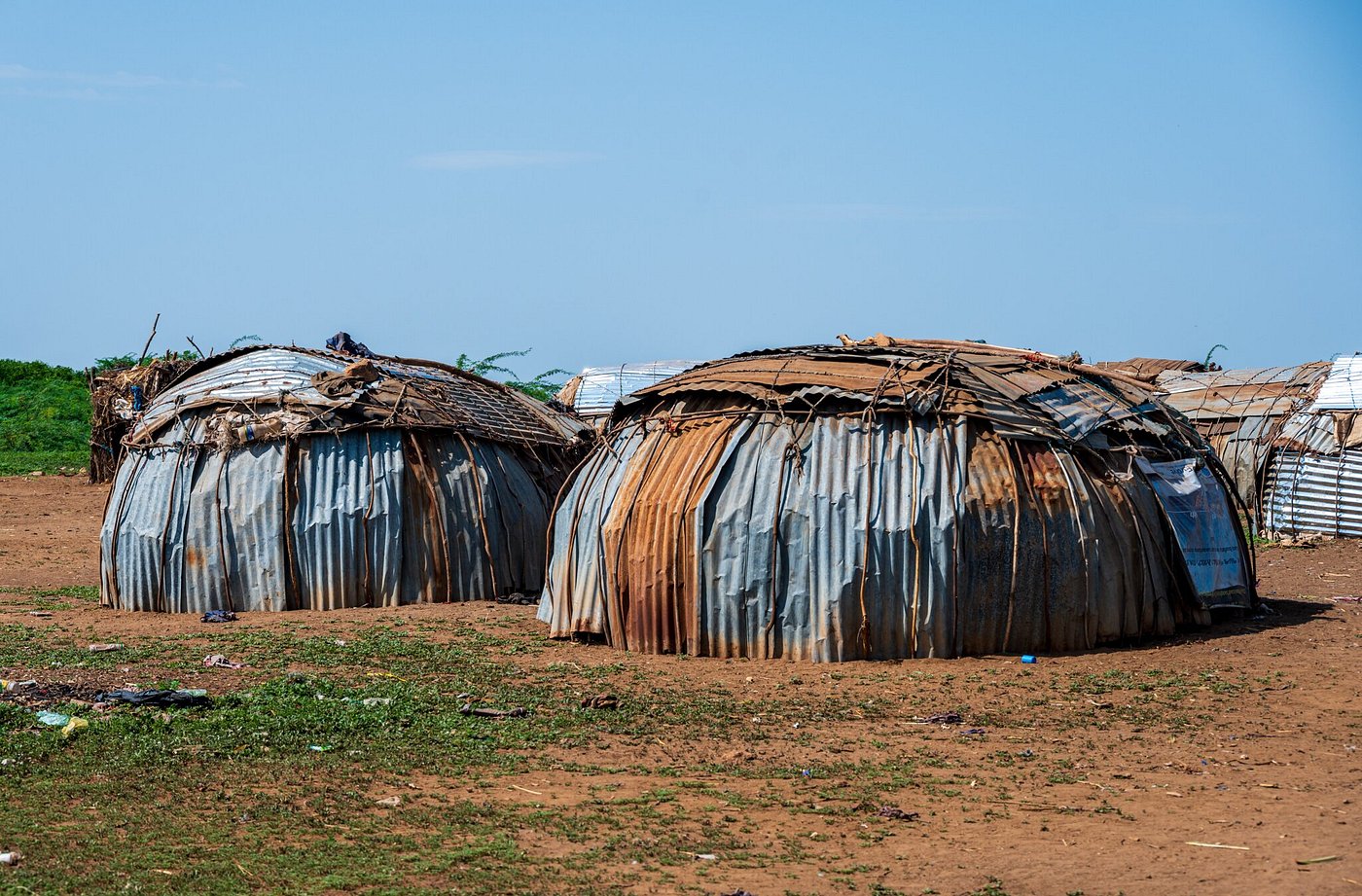 Traditional corrugated metal dome huts in an Omo Valley village, Ethiopia