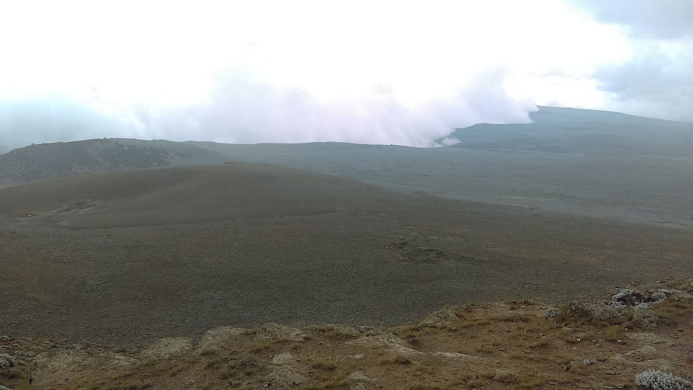 Misty volcanic crater landscape at Erta Ale, Danakil Depression, Ethiopia