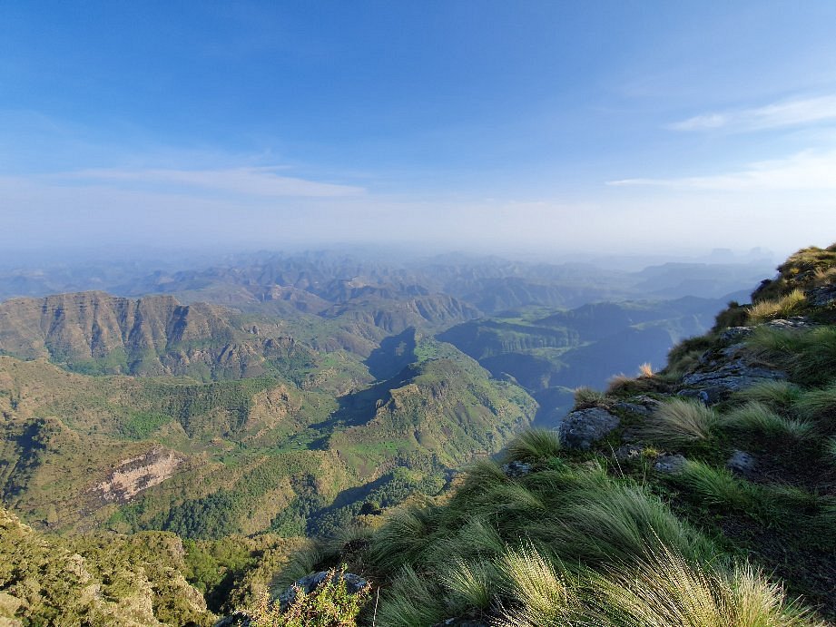 Panoramic view of layered green ridges in Simien Mountains National Park