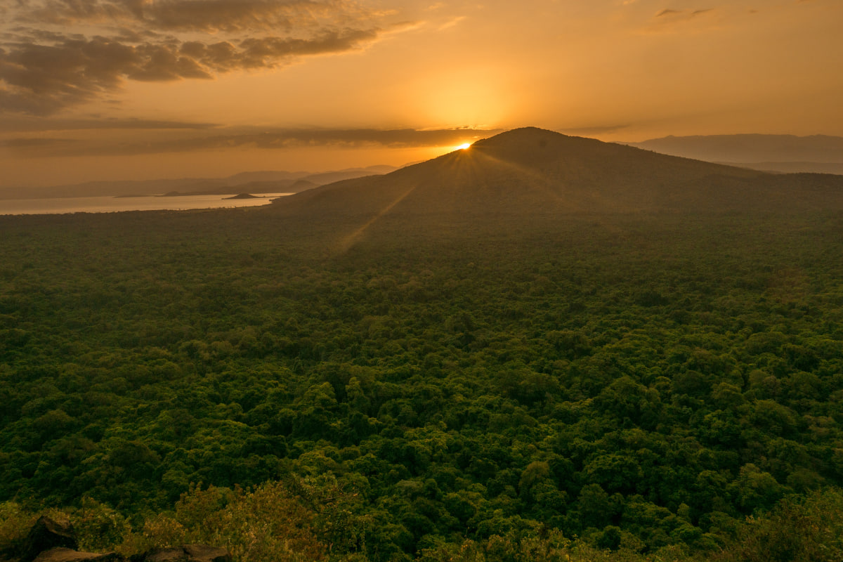 Sunset over the forested hills of Nechisar National Park near Arba Minch