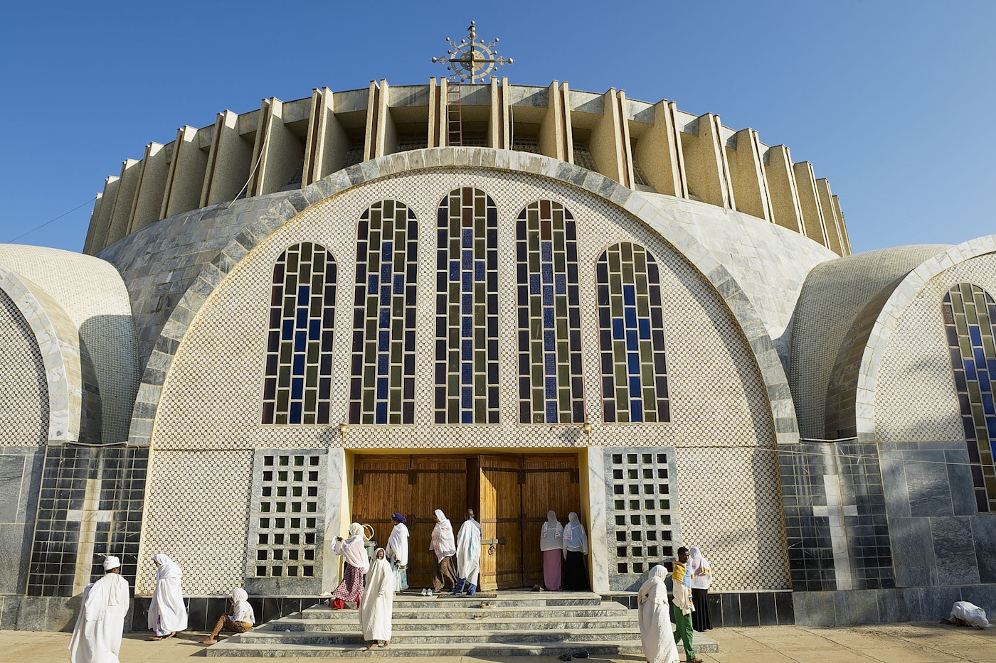 Worshippers in white robes gathered at the entrance of the Church of Our Lady Mary of Zion in Axum